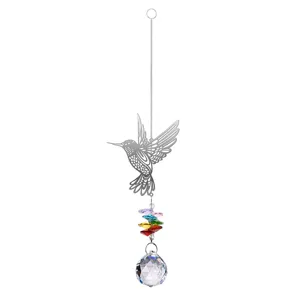 Detailed view of hummingbird crystal suncatcher with rainbow beads and prism ball