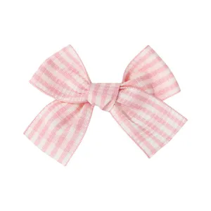 Pink and white gingham fabric bow hair clip for children and babies