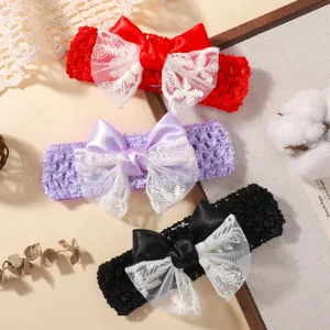 Detailed view of hollow baby headbands with lace bows in red, purple and black colors.