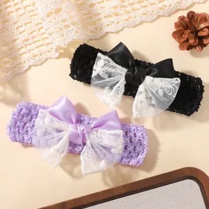 Detailed macro view of lace bow and hollow breathable mesh on infant baby headbands
