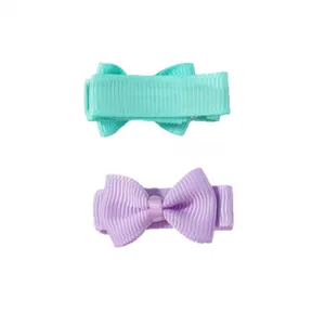 Set of 2 cute candy-colored ribbon bow hair clips for girls in turquoise and purple