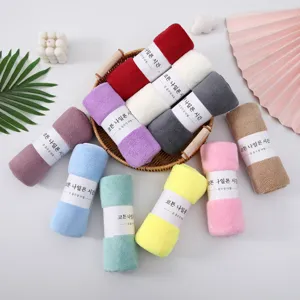Soft coral fleece face towel, absorbent and quick-dry bath towel for daily personal use.
