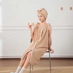 Detail view of wearable bath towel and dry hair cap, soft absorbent fabric for women home use