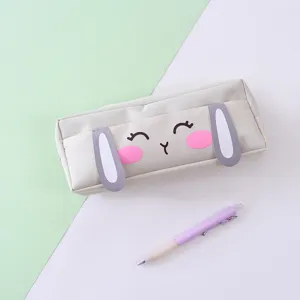 Cute rabbit design canvas pencil case detail view, clean pastel aesthetic stationary storage bag.