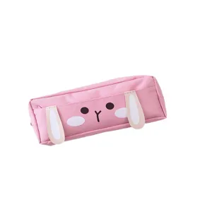 Large capacity pink canvas pencil case with cute cartoon bunny ears design for students.