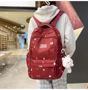 Cute printed student school backpack with large capacity, stylish and durable daily bag.