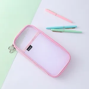 Close-up detail view of a pink mesh pencil pouch with dual zippers and cute front pocket design.