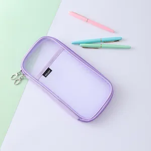 Purple mesh pencil case detail view showing front compartment and zipper pullers clearly.