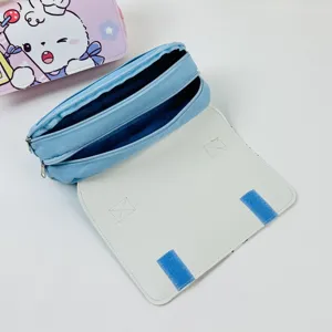 Double layer canvas pencil case with zipper and velcro flap, detailed view of storage space.