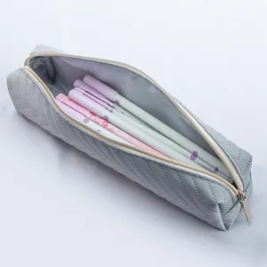 Stylish grey quilted pencil case with large capacity and smooth zipper closure for daily use.