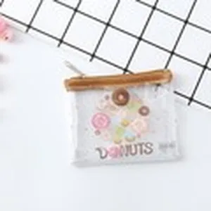 Transparent PVC coin purse with cute donut pattern, small portable zipper storage bag main view.