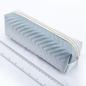 Detailed view of large capacity quilted pencil case with smooth zipper closure for daily use.