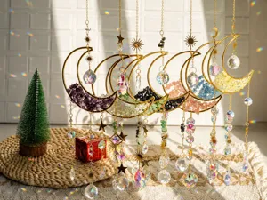 Set of 7 colorful crystal moon suncatchers hanging in a sunlit room for window decor