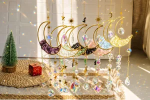 Set of seven crystal moon sun catchers creating beautiful rainbow light patterns