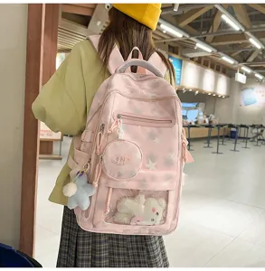 Zaino scolastico rosa con stelle, dettaglio orsetto di peluche e astuccio abbinato