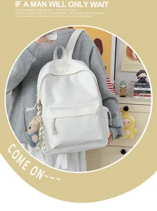 Sac à dos d'école blanc minimaliste de grande capacité pour filles en décor de vie