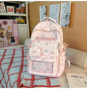 Zaino scolastico estetico rosa con motivi a stelle bianche e mini pochette coordinata