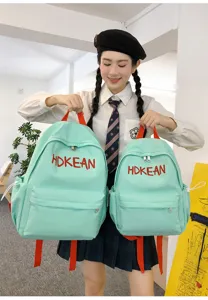 Mannequin avec sacs à dos étudiants vert menthe et broderie HDKEAN en deux tailles