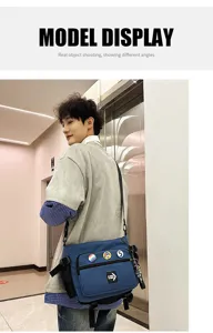 Asian male model wearing a blue large capacity workwear style messenger bag in hallway