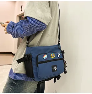 Blue large capacity workwear messenger bag for daily commuting and school use.