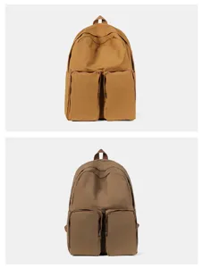 Front view of two large-capacity casual backpacks in mustard yellow and khaki brown.