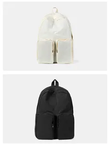 Front view of black and white lightweight backpacks with double large pockets