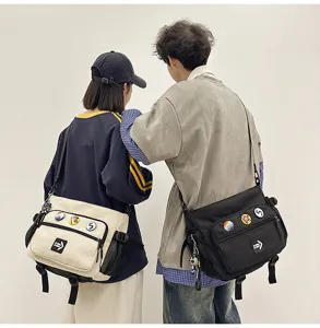 Korean style oversized messenger bag for students, durable canvas crossbody bag in black and beige