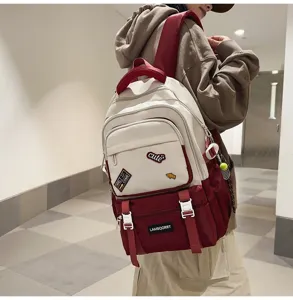 Stylish cream and burgundy color-block student backpack with cute decorative patches