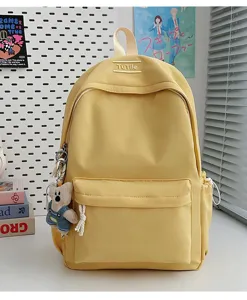 Sac à dos étudiant jaune minimaliste de grande capacité avec un charmant ours en peluche
