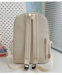 Vue arrière détaillée du sac à dos scolaire beige avec bretelles rembourrées et poche