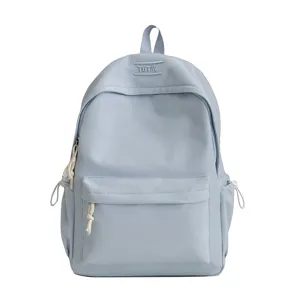 Vue détaillée de face d'un sac à dos d'étudiant bleu clair minimaliste à grande capacité