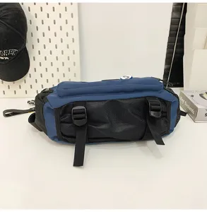 Detailed top-down view of a durable blue and black large capacity workwear messenger bag