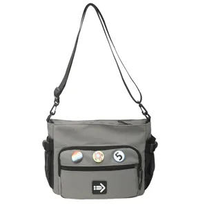 Grey workwear style large capacity messenger bag for students and commuters with pins
