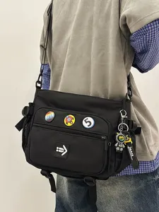 Large capacity Korean style black utility messenger bag for students and commuting