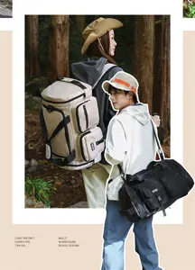 Travel duffel bag with multi-pocket design for fitness and sports shown in forest setting