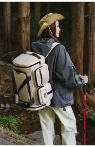 Detailed view of beige multi-pocket sports travel bag used in outdoor hiking