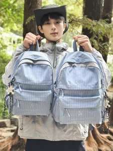 Sac à dos à carreaux bleu clair pour étudiants avec grande capacité et porte-clés