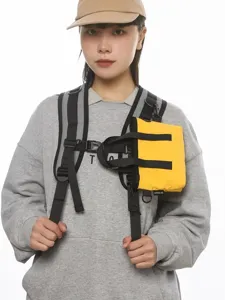 Stylish yellow color-contrast small square bag with functional strap system