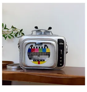 Creative retro TV design handbag featuring a 'No Signal' screen pattern and silver finish.