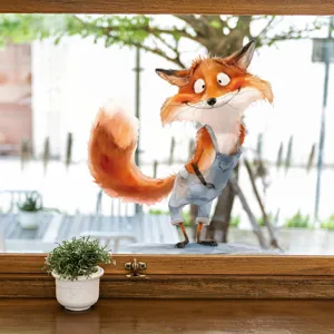 Whimsical cartoon fox window sticker applied on a transparent glass window surface