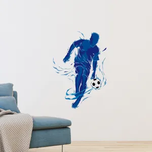 Dynamic blue soccer player wall sticker shown in a modern living room setting