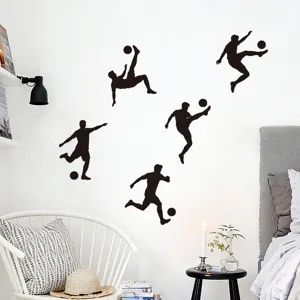 Stickers muraux de joueurs de foot noirs décorant un mur de chambre blanc