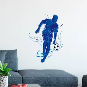 Detail view of blue soccer athlete wall decal in a modern living room setting