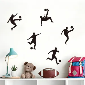 Stickers muraux silhouettes de footballeurs noirs dans une chambre d'enfant