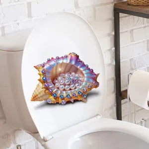 Autocollant de toilette 3D avec un coquillage luxueux, des perles et des gemmes