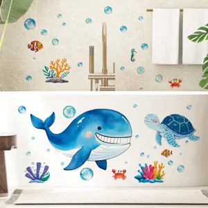 Detailed view of cartoon ocean whale and turtle waterproof stickers on a white bathtub