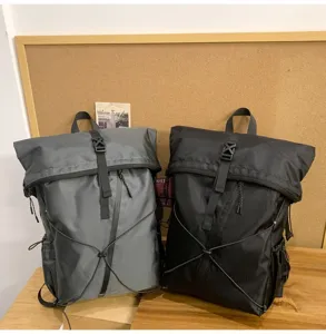 Waterproof black and grey large capacity roll-top business backpacks for daily travel