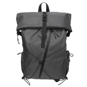 Detailed view of dark grey roll-top business backpack with front elastic cord design