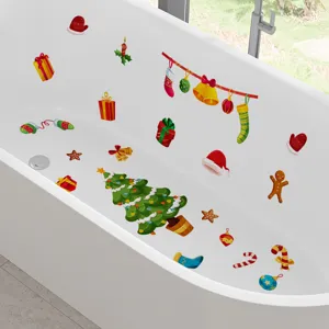 Autocollants de Noël étanches avec sapin et cadeaux appliqués dans une baignoire