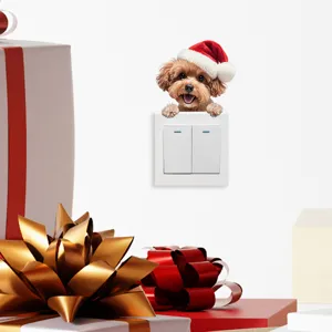 Simpatico adesivo per cani di Natale con cappello da Babbo Natale su interruttore